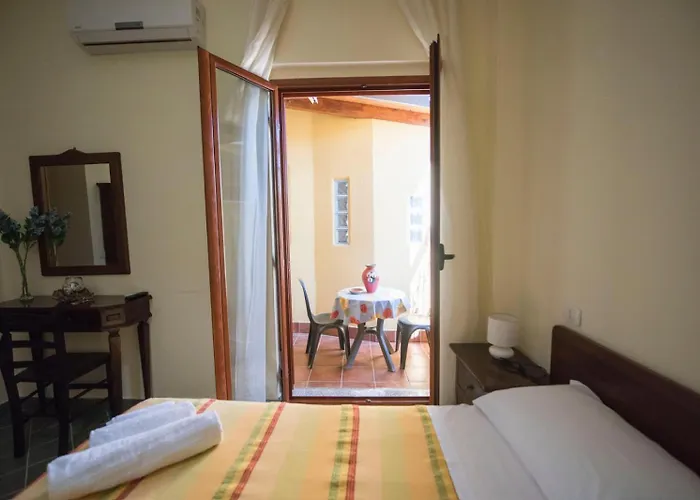 לינה וארוחת בוקר Casa Cosmano 3*